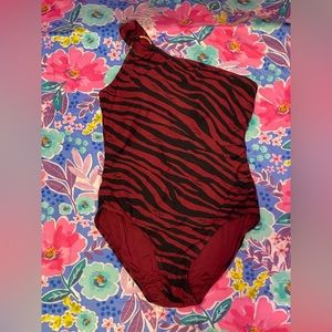 One piece swim suit with asymmetrical style